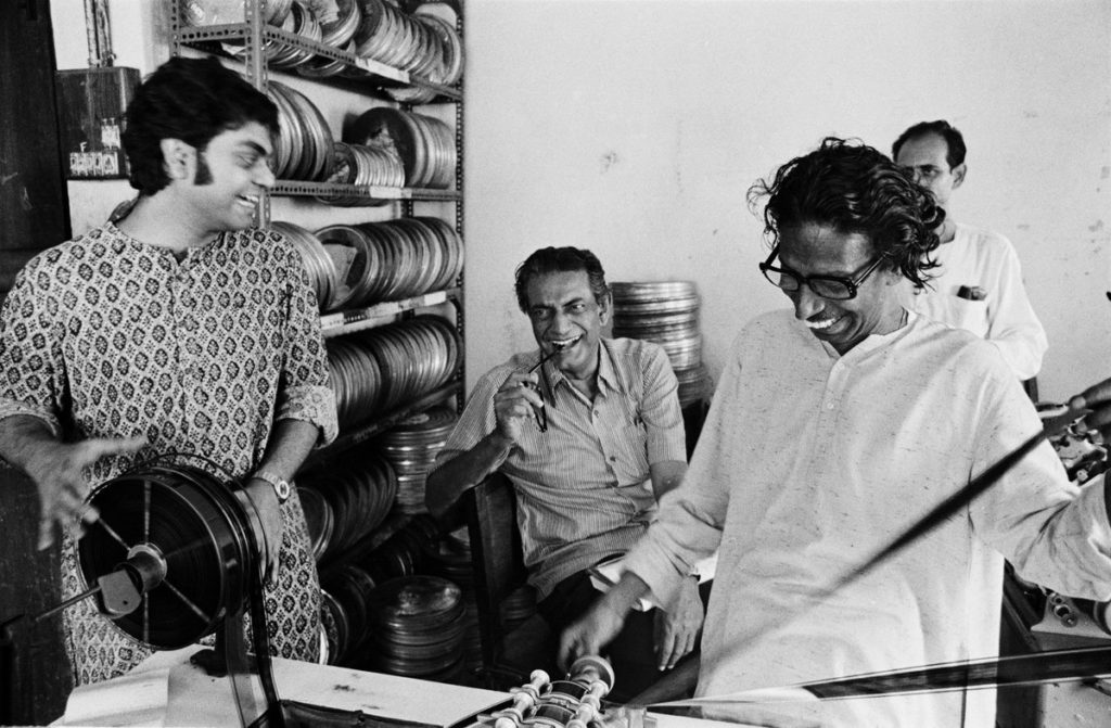 Satyajit Ray with his son, editing THE CHESS PLAYERS. Photo by Pablo Bartholomew, 1978