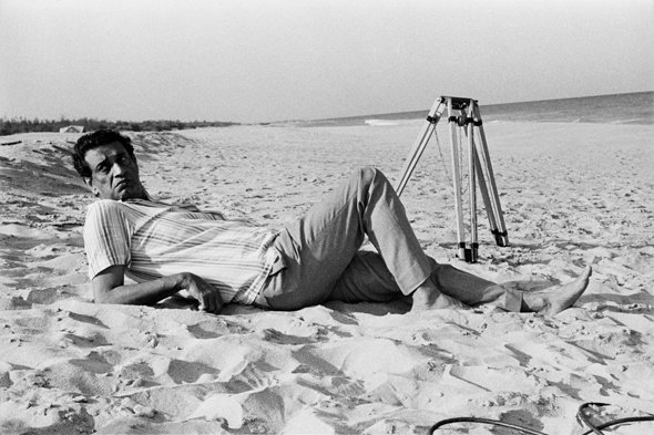 Satyajit Ray on location at the shore temple beach on the outskirts of Madras during the filming of Bala